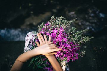 flowers in hands