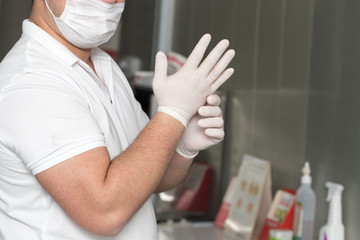 dentist puts gloves