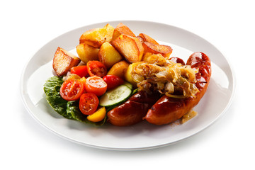 Grilled sausages and vegetables