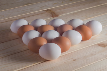 Eggs on the wooden table