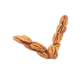 Yes tick made of pecan nuts isolated