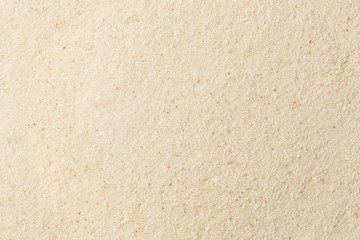 Background of yellow dry raw wheat semolina