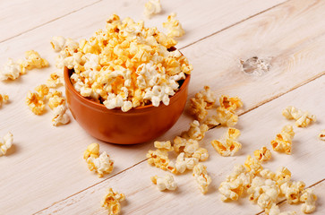  Cheese popcorn in a brown bowl