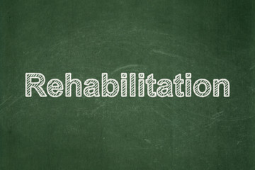 Obraz premium Healthcare concept: Rehabilitation on chalkboard background