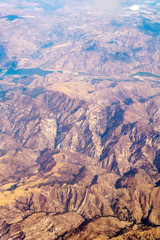 Aerial photo of a mountains in California from the plane during the flight