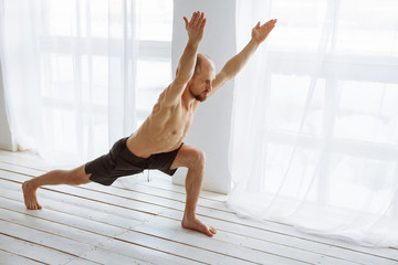 Man practicing advanced yoga. A series of yoga poses. Lifestyle concept