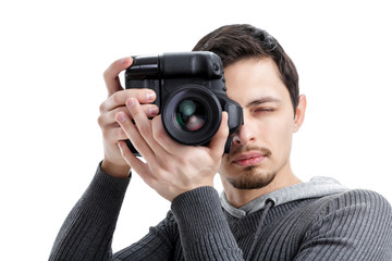 successful professional photographer use DSLR digital camera iso