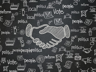 Political concept: Handshake on School board background