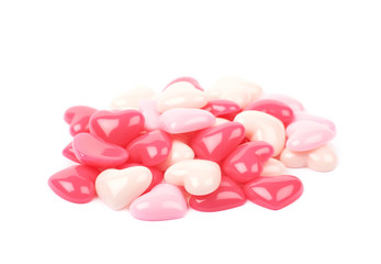 Obraz na płótnie Canvas Pile of heart shaped beads isolated