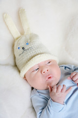 Newborn in his bed