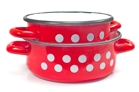 Red cooking pot with dots isolated on white