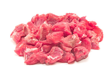 Chopped beef meat for goulash isolated on white