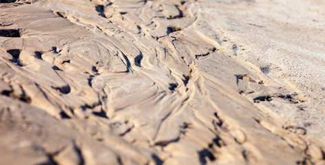 Sand surface with the relief formed by water currents