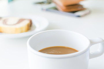Coffee time in the morning, coffee cup with smartphone and wallets.