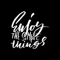 Enjoy the simple things. Hand drawn lettering. Vector typography design isolated on black background. Handwritten inscription.