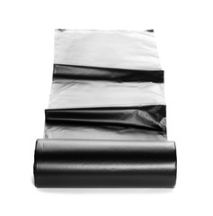  black roll of plastic garbage bags isolated on white