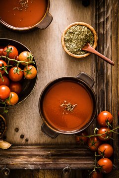 Tomato soup on wood