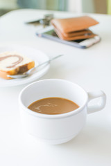 Coffee time, coffee cup with bread and smartphone & wallets.