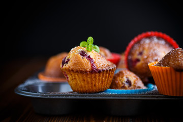 sweet muffins with berries inside