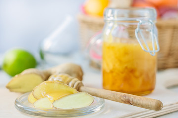 Healthy eating - honey and ginger root slices.