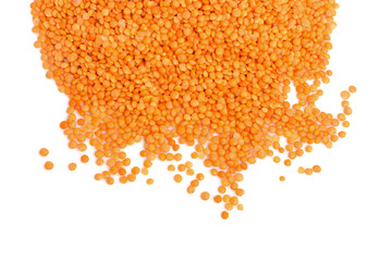 Red lentils on white background