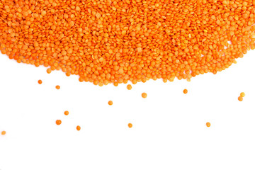 Red lentils on white background