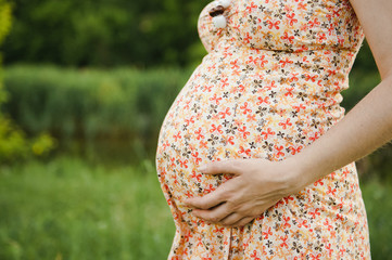 Pregnant woman in the park