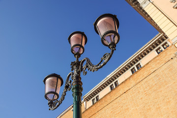 Fototapeta na wymiar retro vintage street lamp isolated on sky background