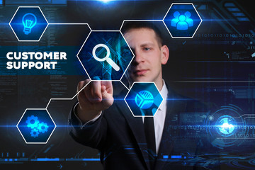 Business, Technology, Internet and network concept. Young businessman working on a virtual blackboard of the future, he sees the inscription: customer support