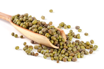 mung bean in a wooden scoop isolated on white background