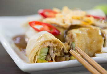 Fresh spring rolls with vegetables in white dish