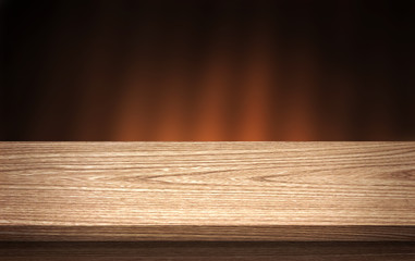 Wood background table. Empty wood table top and blur in dark night background. For montage product display