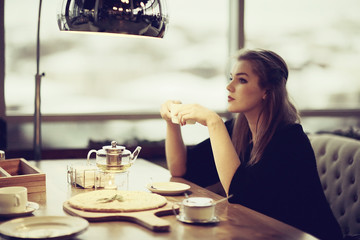 young adult girl in cafe