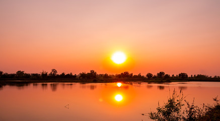 Beautiful landscape sunset at the river in the evening.