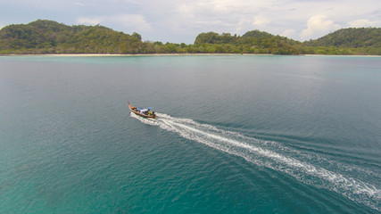 Amazing view to boat sailing in open sea at windy day. Drone view - birds eye angle. - Boost up color Processing.