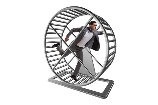 Business concept with businessman running on hamster wheel