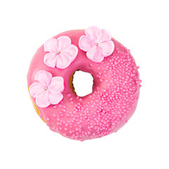Strawberry donut with pink glaze, decorative sprinkles and flowers