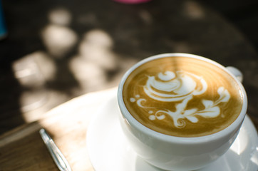 Close up hot Latte Art Coffee in the mug.