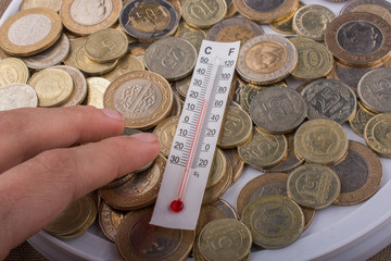 Thermometer and Turkish Lira coins