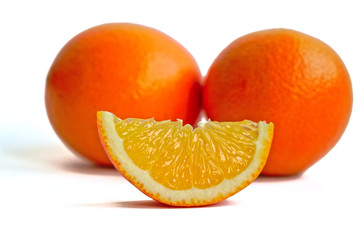 Closeup of oranges on a white background