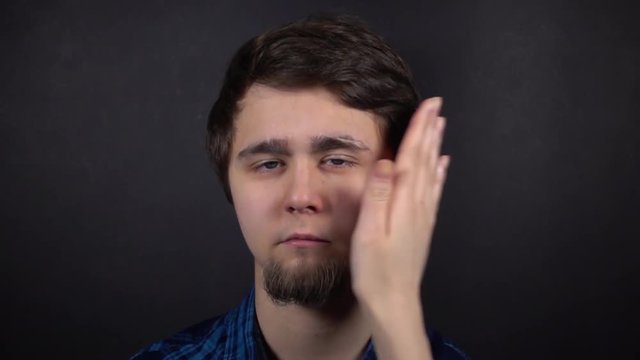 Women's hand beats the face. Slap in the face. Slow motion