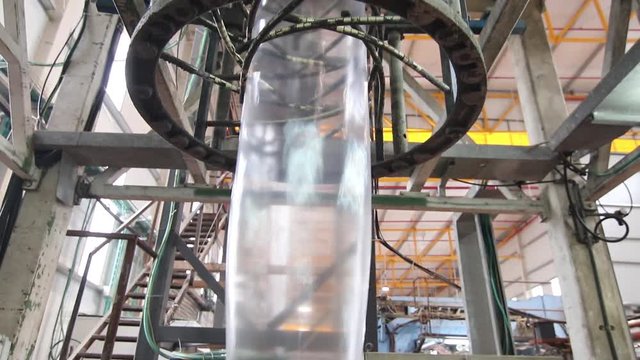 Extrusion of plastic bag in a factory