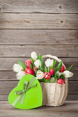 Colorful tulips bouquet and gift box