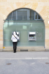 Girl at ATM