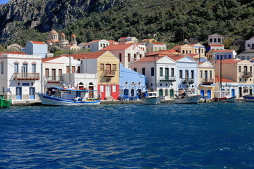 Fototapeta na wymiar Fishing boats moored to the east side-main harbor. Kastellorizo-Greece. 1726