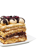 Chocolate Cranberry Layer Cake Isolated on a white background. Selective focus.