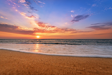 Naklejka na ściany i meble Sunset on the beach of caribbean sea.