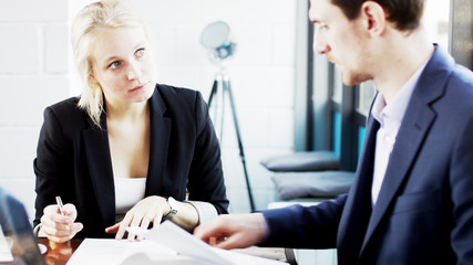 Businessman Gives His Colleague Documents to Sign