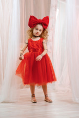 Cute girl in puppet look body paint. Young lady acts as a doll.