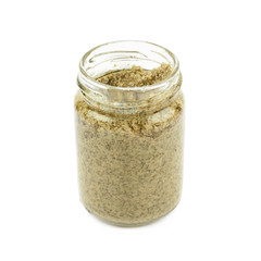 Glass jar of italian pesto isolated